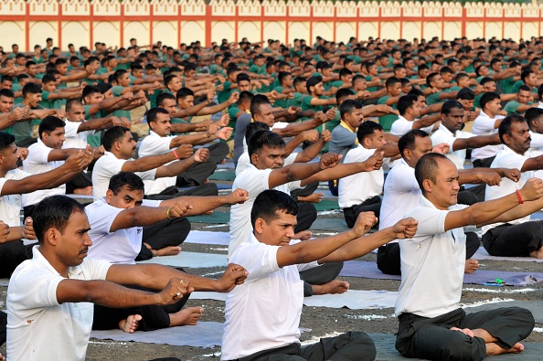 Practising Yoga, deep breathing may help relieve stress: Study