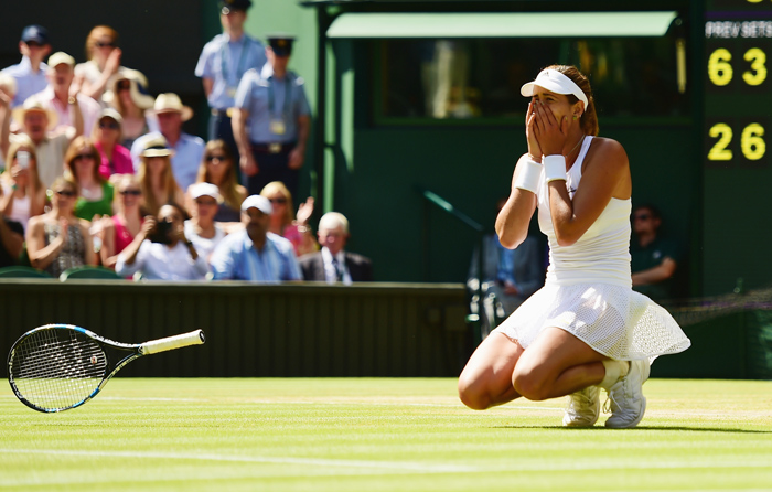 Muguruza hammers Williams to clinch maiden Wimbledon title