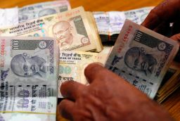Rupee crashes to 65 against dollar, down 22 paise amid fresh dollar demands 
