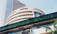 Sensex shapes up, gains 214 points on capital inflows 
