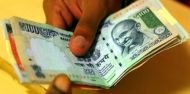 Rupee slips 74 paise against dollar in early trade 