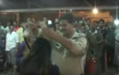 Caught on camera: UP Police officials showering money on dancing girls during a religious programme 