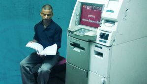 An ATM guard who's always with a book, and why he'll vote NOTA 