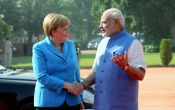 Angela Merkel brings Durga and 1.4 billion Euros for Indian solar power 