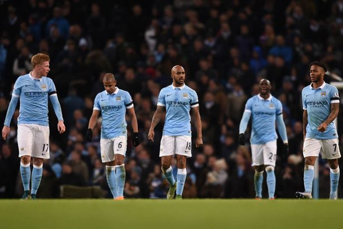 Manchester City ease past Huddersfield to cut Liverpool's lead in Premier League