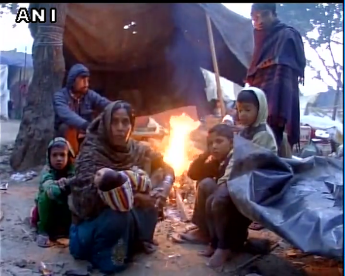 Shakur Basti residents spend a night shivering in the open after demolition drive 