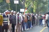 National Herald: Congress supporters gather outside Delhi party office 