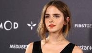 Emma Watson risked wardrobe malfunction in low white gown