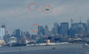 Man claims to capture three UFOs in a photo near Statue of Liberty in New York 