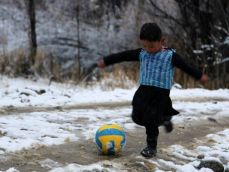 Afghan boy from insurgency-prone area wearing plastic Messi jersey becomes Internet sensation  