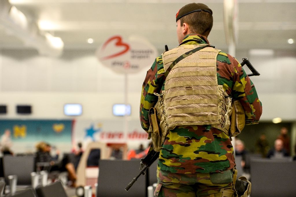 Man with suicide bomb belt shot at Brussels central station