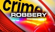 Woman fails to loot bank, gets locked inside; incident caught on cam