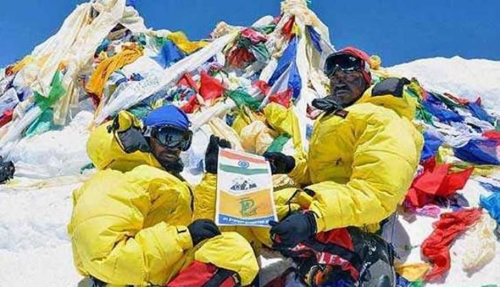 Rajib Bhattacharya (L) with fellow mountaineer Dipankar Ghosh in June 2011 after scaling the Mt Everest. (Photo: PTI)
