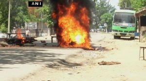 Former Bihar CM Manjhi's convoy vehicle set on fire by protestors 