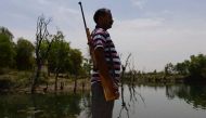 The tragedy of scarcity: armed guards defend water in Bundelkhand 