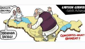 Karnataka Municipality removes hoarding depicting Rahul Gandhi hiding from PM Modi  