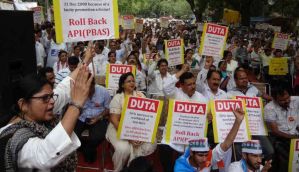 DU teachers hold protests over regularisation of ad hoc & temporary faculty 