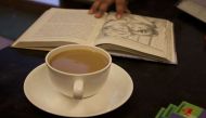 Sip on some delectable coffee while you read at these cosy book cafes in Delhi 