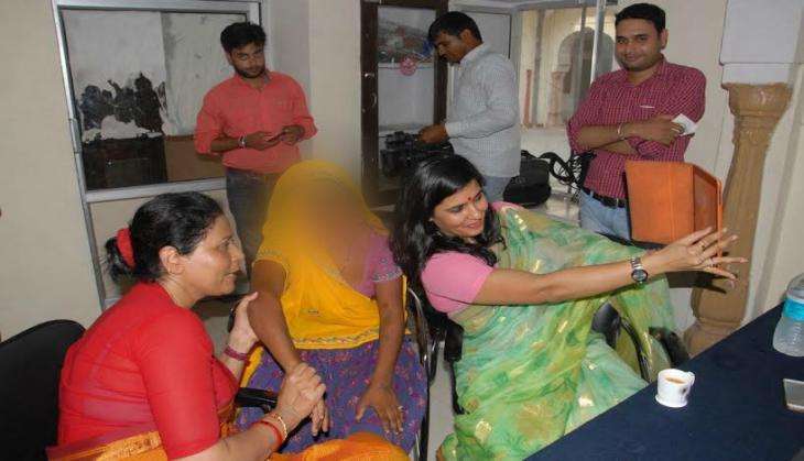 Rajasthan women panel member clicks selfie with rape victim who was tattooed with expletives 