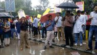Cops outnumber teachers at rainy-day protest against UGC 