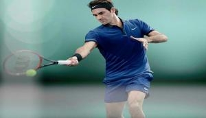 Roger Federer beats Rafael Nadal in straight sets to clinch his second Shanghai title