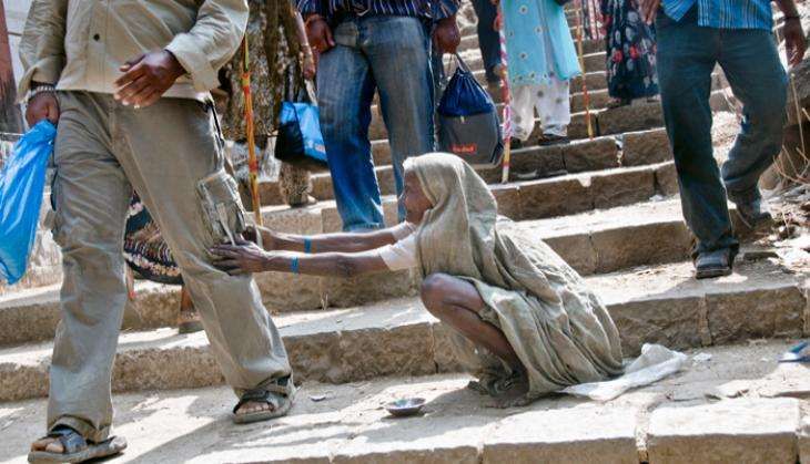 beggars-in-mumbai-lead-gettyimages-168330737.jpg