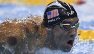 Medal machine Michael Phelps becomes 3rd Olympian to win gold in the same event at four Games 