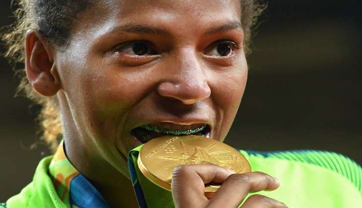 Martial artist Rafaela Silva wins host nation Brazil's first gold medal