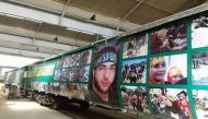 Why is Pakistan's Azadi Express train covered with posters of Burhan Wani? 
