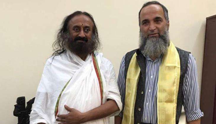 Burhan Wani father with Sri Sri Ravi Shankar.jpg