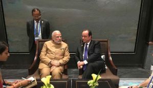 China: PM Modi meets French President Francois Hollande in Hangzhou 