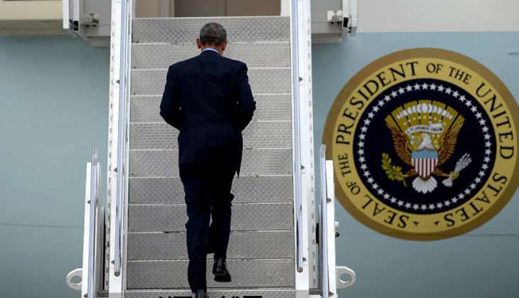Obama on a staircase