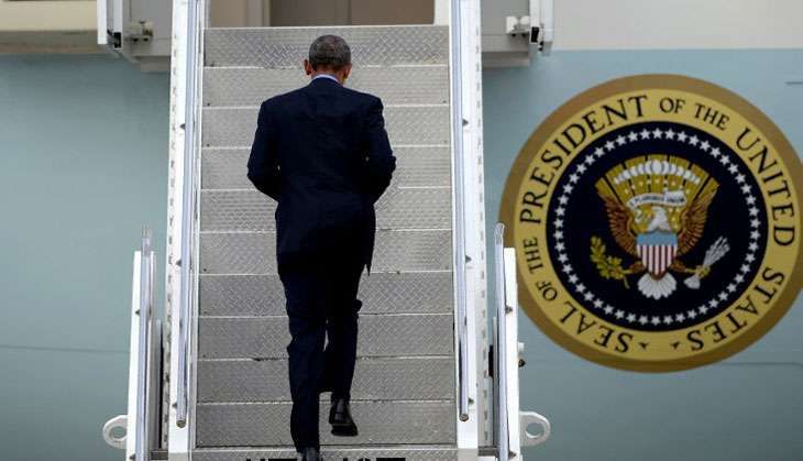 Obama on a staircase