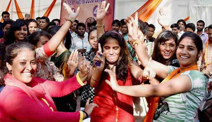 ABVP candidates celebrate after winning the DUSU elections in Delhi on Saturday