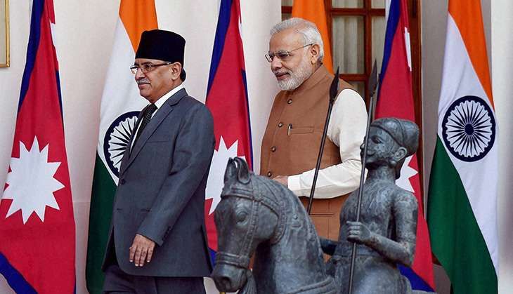 Prime Minister Narendra Modi along with his Nepalese counterpart Pushpa Kamal Dahal arrive for a meeting at Hyderabad House in New Delhi on Friday.