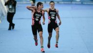 Viral: Olympian stops younger brother from collapsing at triathlon, helps him get 2nd place 