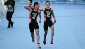 Viral: Olympian stops younger brother from collapsing at triathlon, helps him get 2nd place 