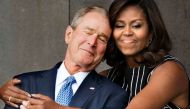 Michelle Obama hugging George Bush makes the internet happy. And then this happened 