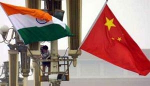 India, China sign four MoUs, agree to organise 100 activities