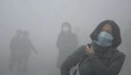 Beijing issues yellow alert for air pollution 