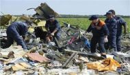 Dutch investigators say MH17 was downed by Russian missile, killing 298 on board 