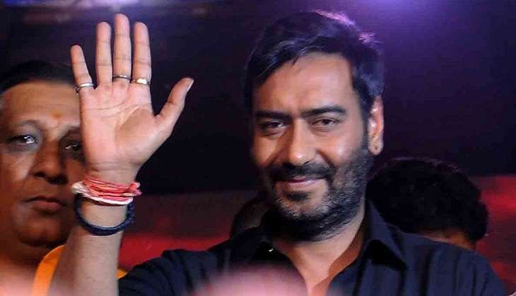 Ajay Devgn waves to his fans (IANS)