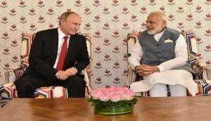 PM Narendra Modi and Russian President Vladimir Putin arrive at New Delhi's Hyderabad House