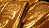 Gold prices gain further at domestic bullion market, silver prices fall 