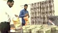 I-T department seizes Rs 2.25 cr new notes from flat guarded by 2 dogs in Bangalore 