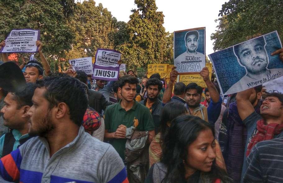 Students march to Parliament to protest against the disappearance of Najeeb Ahmad