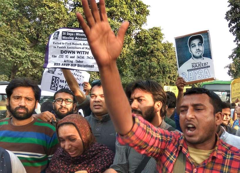 Students march to Parliament to protest against the disappearance of Najeeb Ahmad