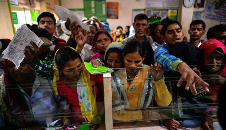 ATM line in Basendua village in Bulandshahr AFP Ph