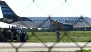 Hijacked Libyan plane: Hijackers release all passengers, surrender 