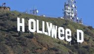 Additional security deployed after LA's famous Hollywood sign was changed to... Hollyweed 